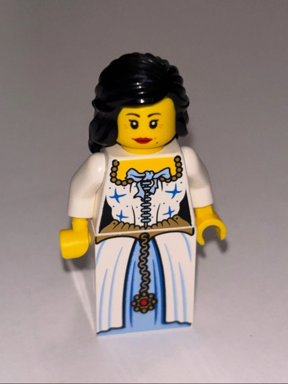 Lego Female Minifigure in White and Light Blue Dress with Black Hair - Picture 7 of 7